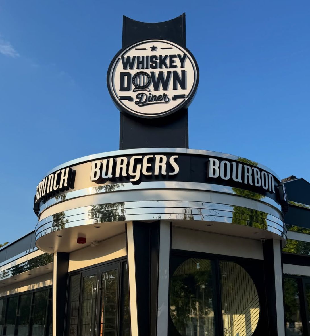 The Whiskey Down Diner sign above the new Babylon Village building