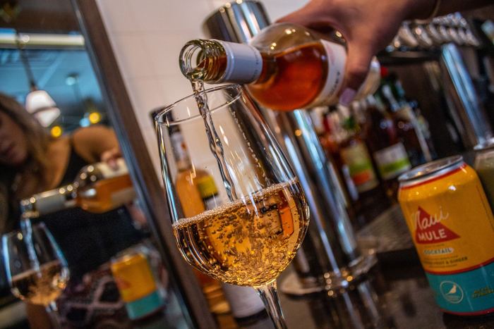 Pouring a bourbon at the bar