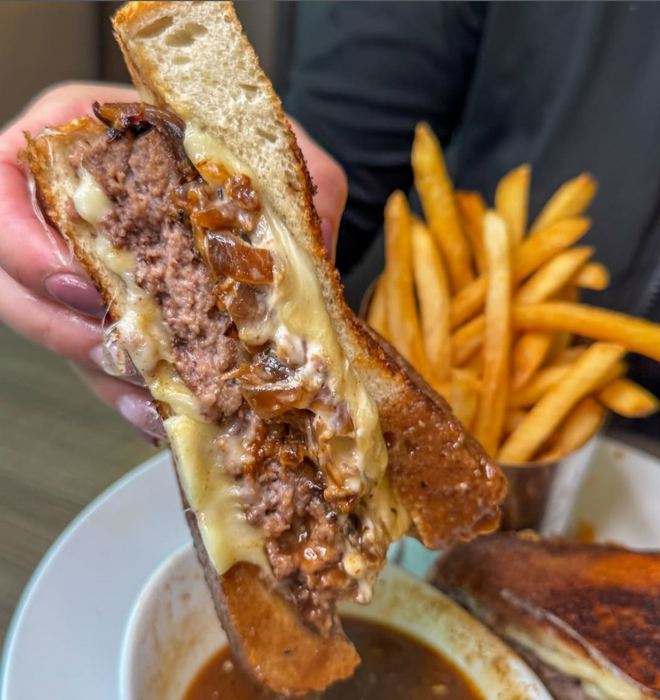 French onion burger on grilled Texas toast, with au jus