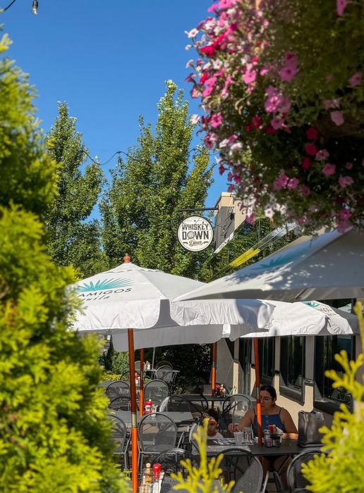 Umbrella tables on the patio in summer