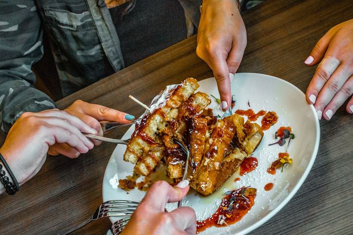 Sharing a plate across the table